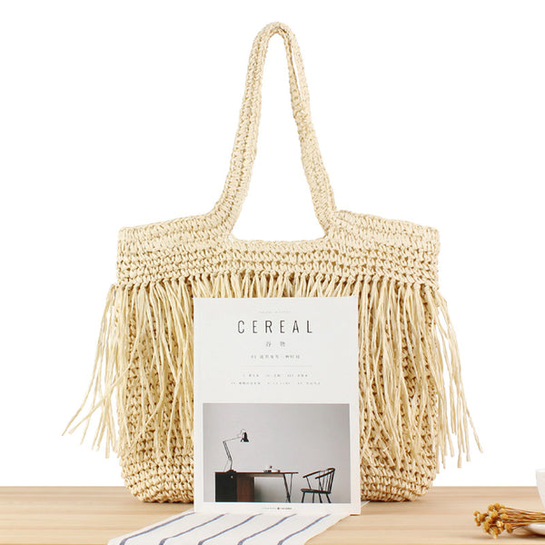Chic Tassel Woven Clutch
